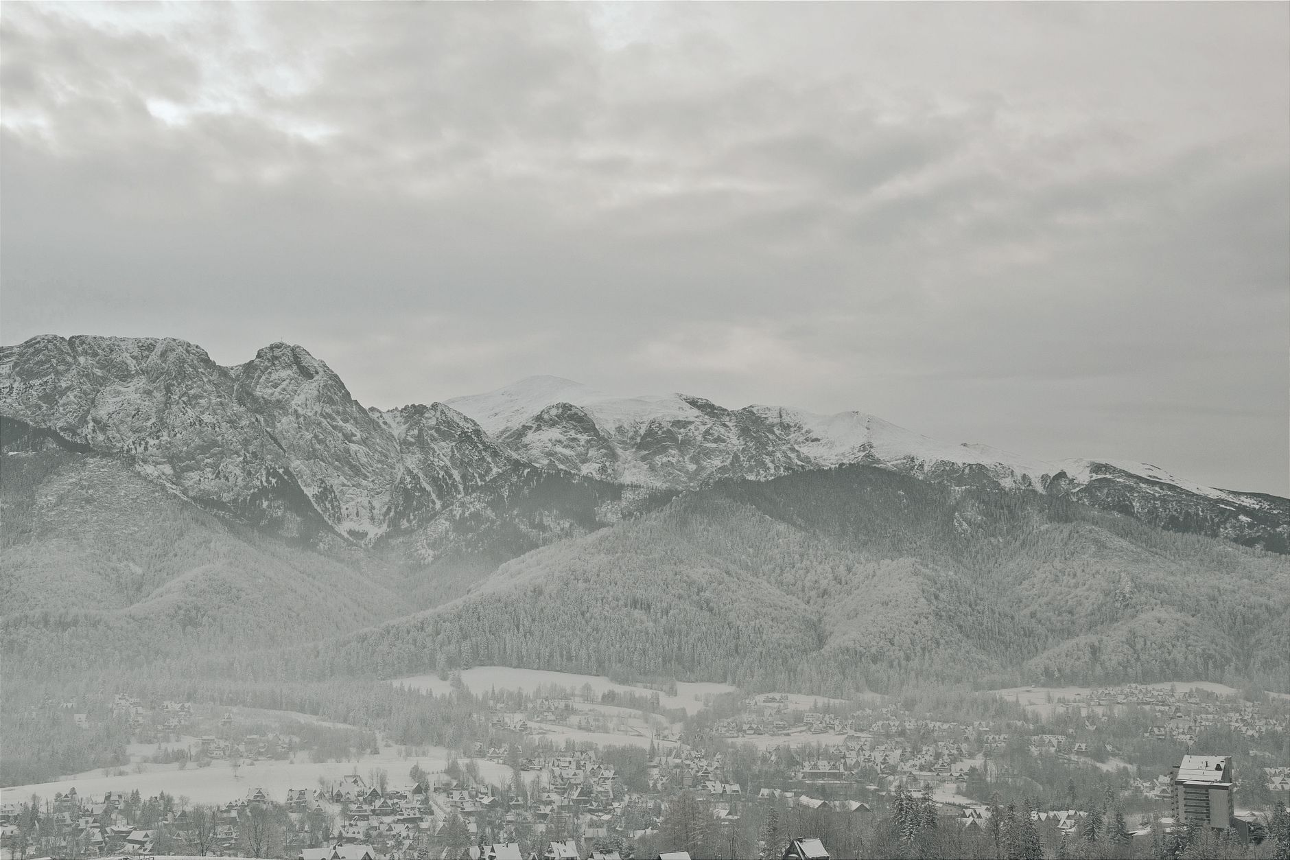 Captivating winter landscape of the Tatra Mountains overlooking Zakopane, Poland.