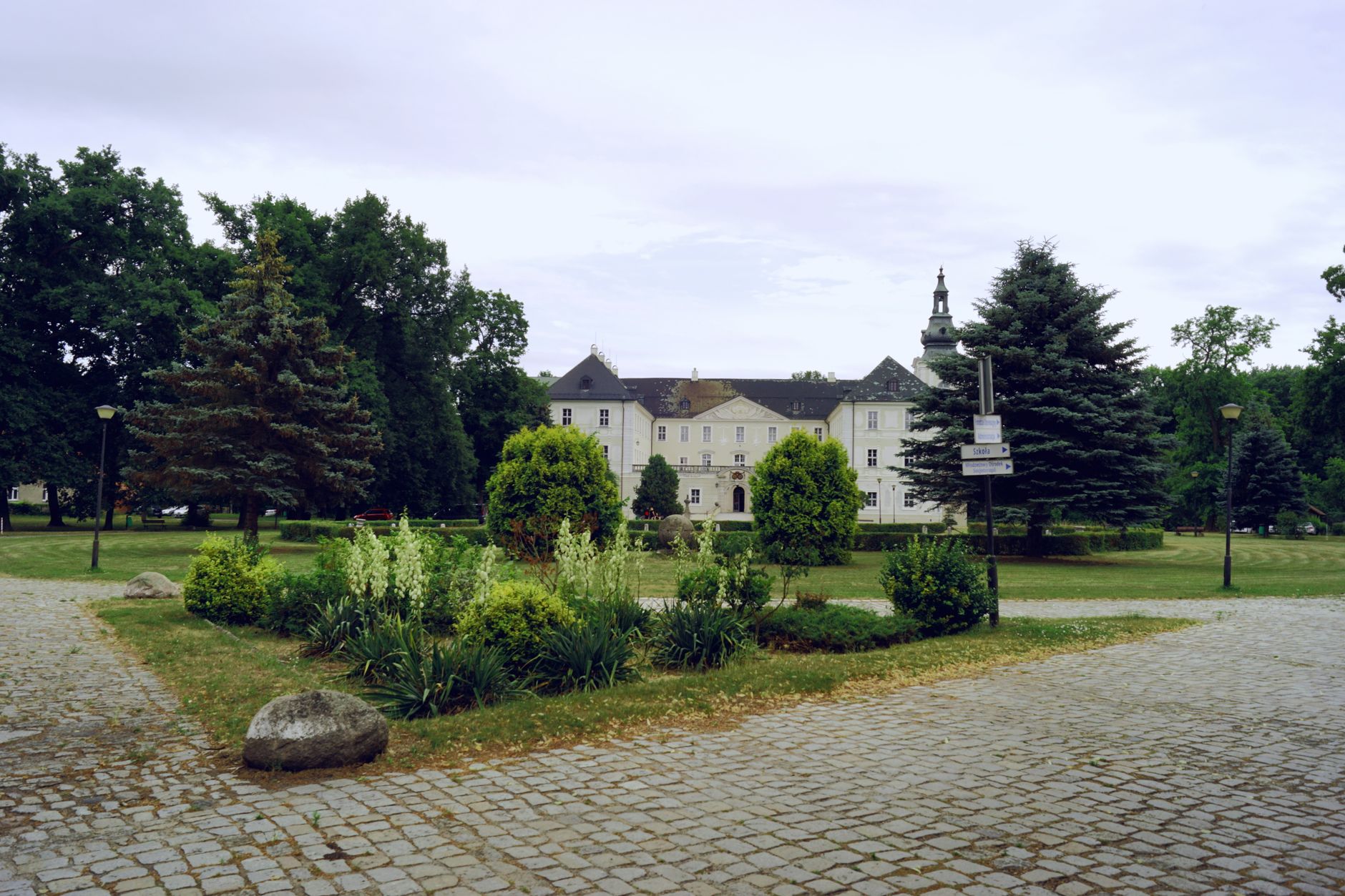 Charming historic mansion surrounded by lush gardens in Zabór, Lubuskie, Poland.