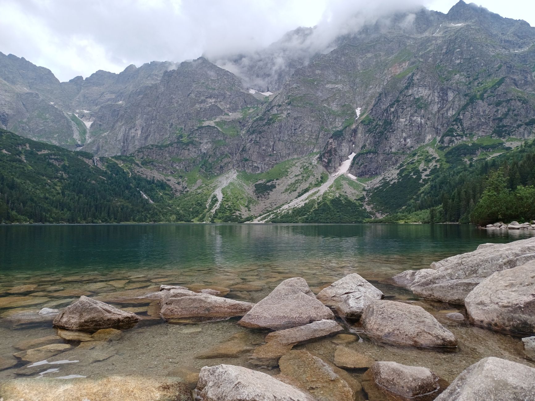 Breathtaking landscape of Morskie Oko Lake surrounded by the Tatra Mountains in Poland.