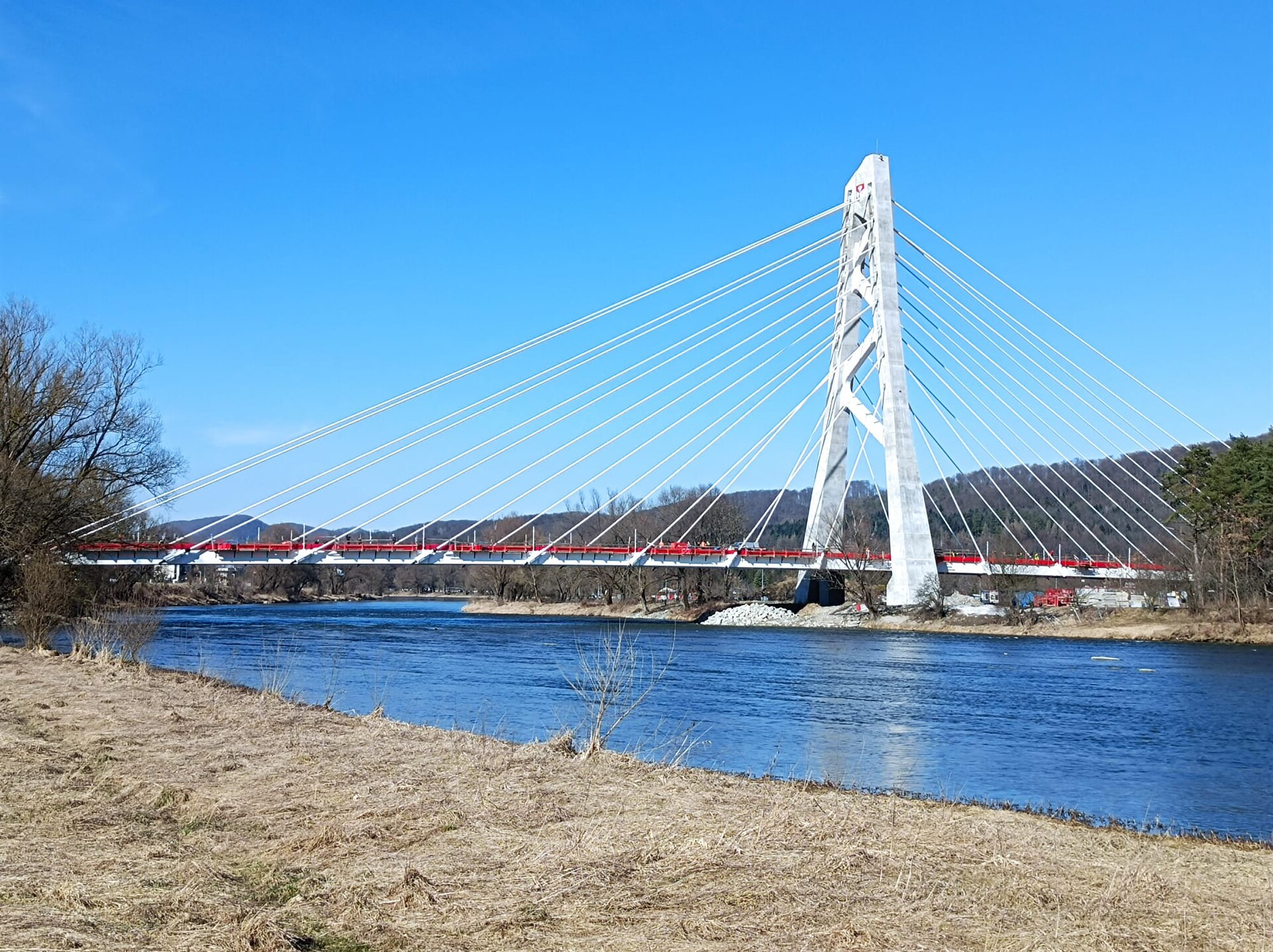Cable-stayed bridge (wantowy) under construction, over the San River in Sanok, connecting Sobieskiego and Gajowa street.